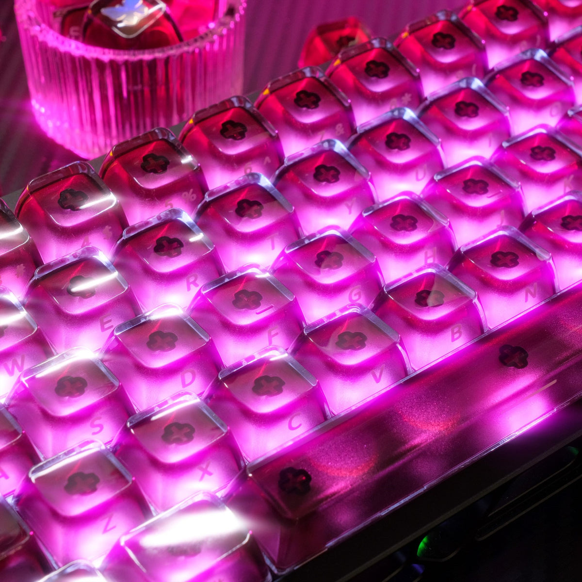 Close-up of glossy clear PC layers and side-printed legends on Burgundy Wine Ice MDA keycaps.