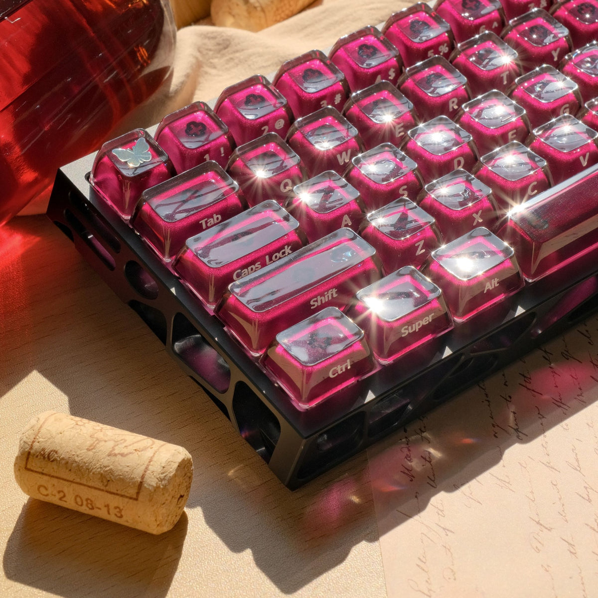 Burgundy Wine Ice PC keycaps with rounded MDA tops, wine-purple cores and side-printed legends.
